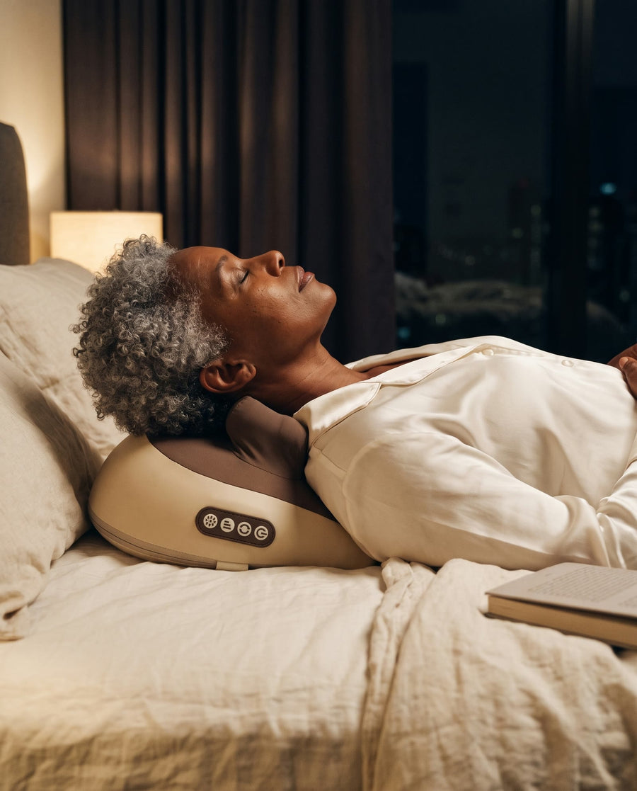 Woman using HiZoo in bed in the evening